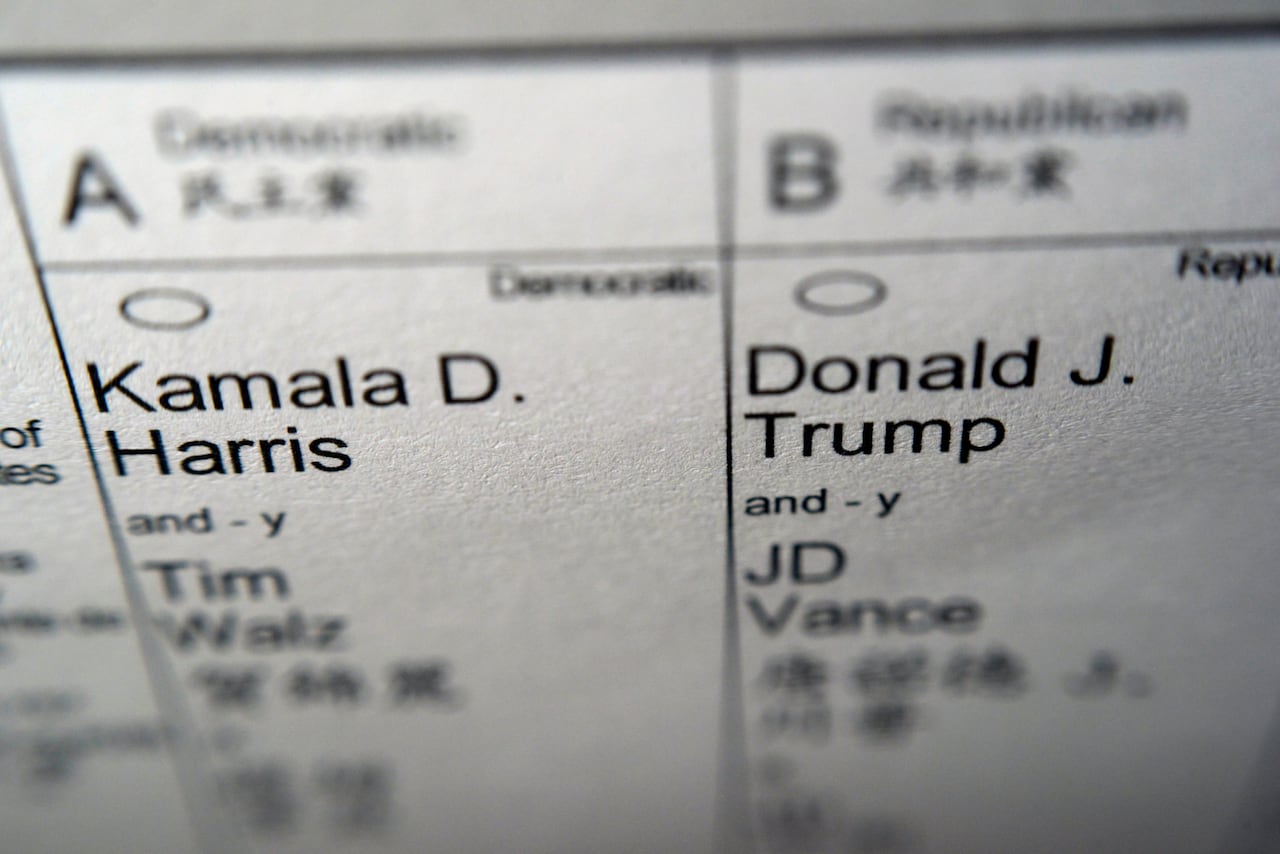 A closeup shows a voting ballot.