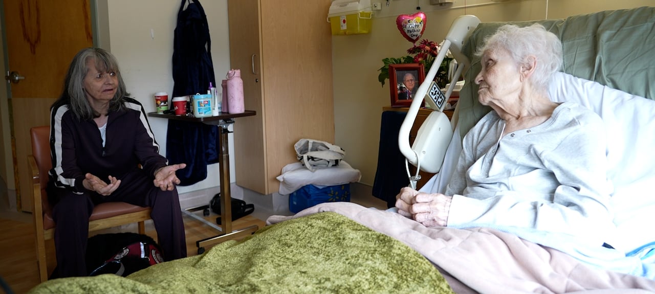 Two women in a hospital room