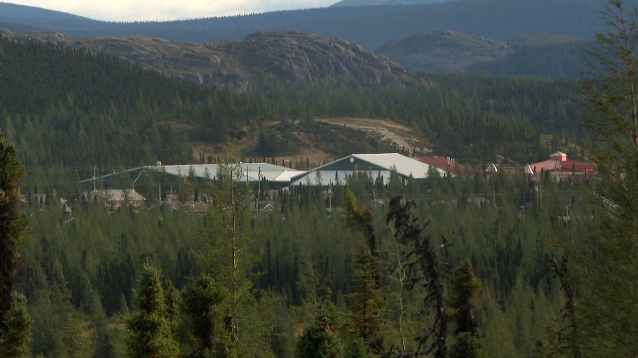 A photo of a town in a wooded area