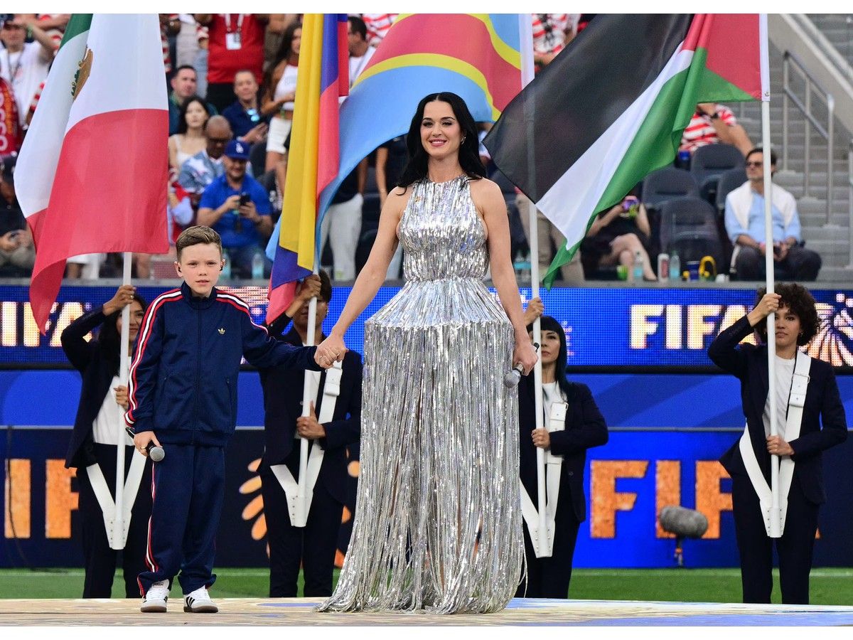 Katy Perry and young singer Tius Luka perform ahead of the 2026 World Cup match between USA and Paraguay at the Los Angeles Stadium on June 12, 2026.