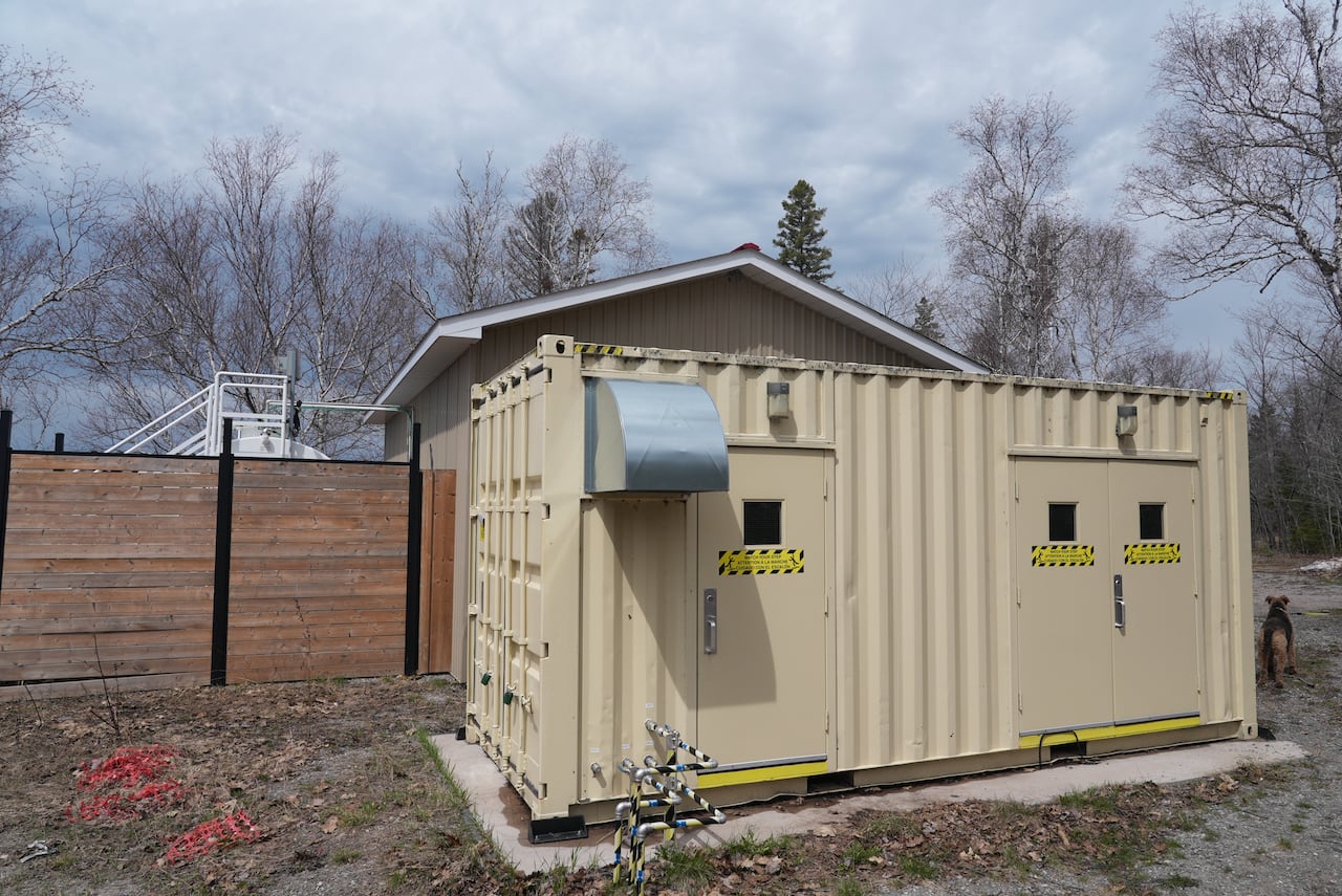 A small structure that resembles a shipping container.