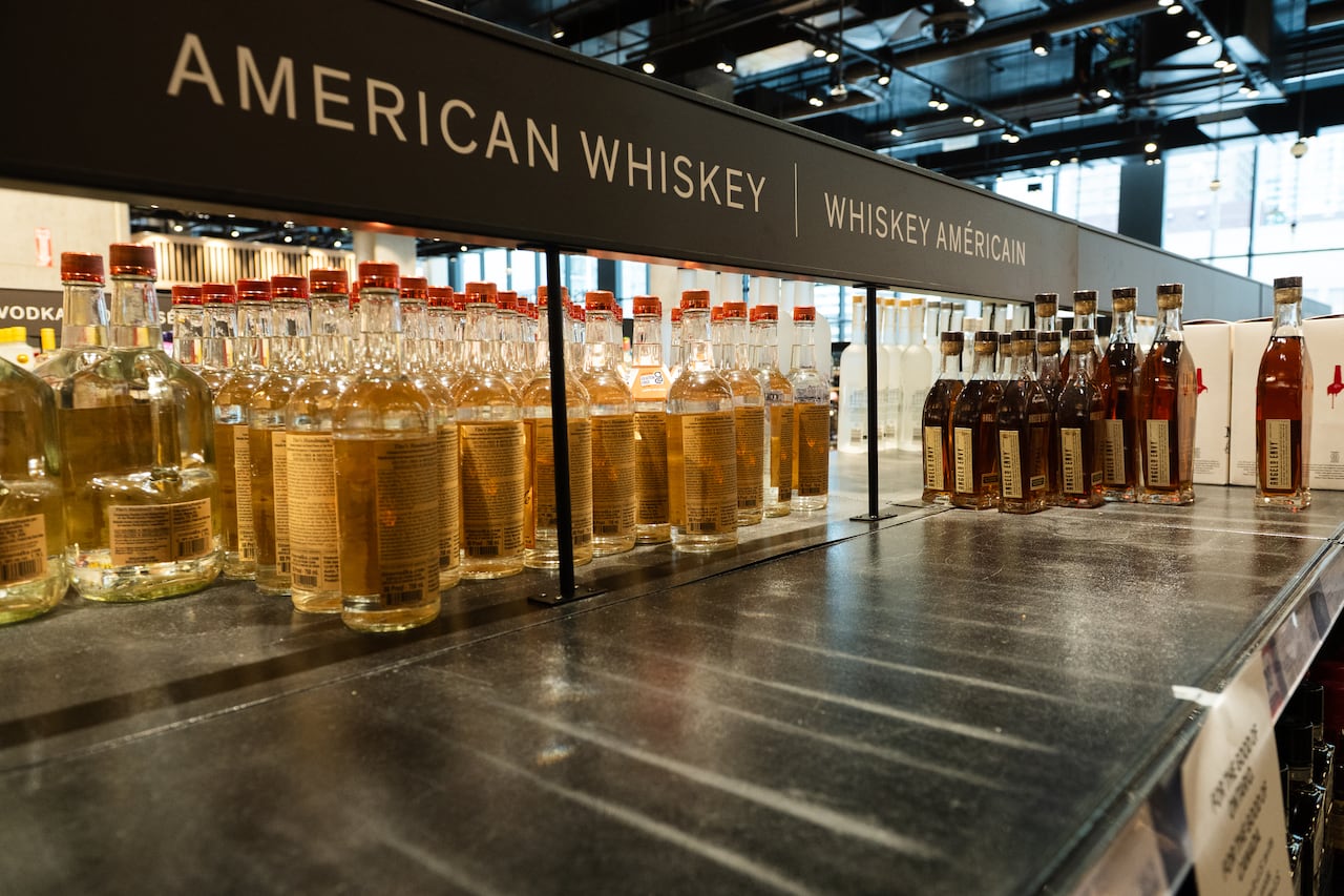 A half-empty shelf of American whiskey is pictured at an LCBO in Toronto on Tuesday, March 4, 2025.
