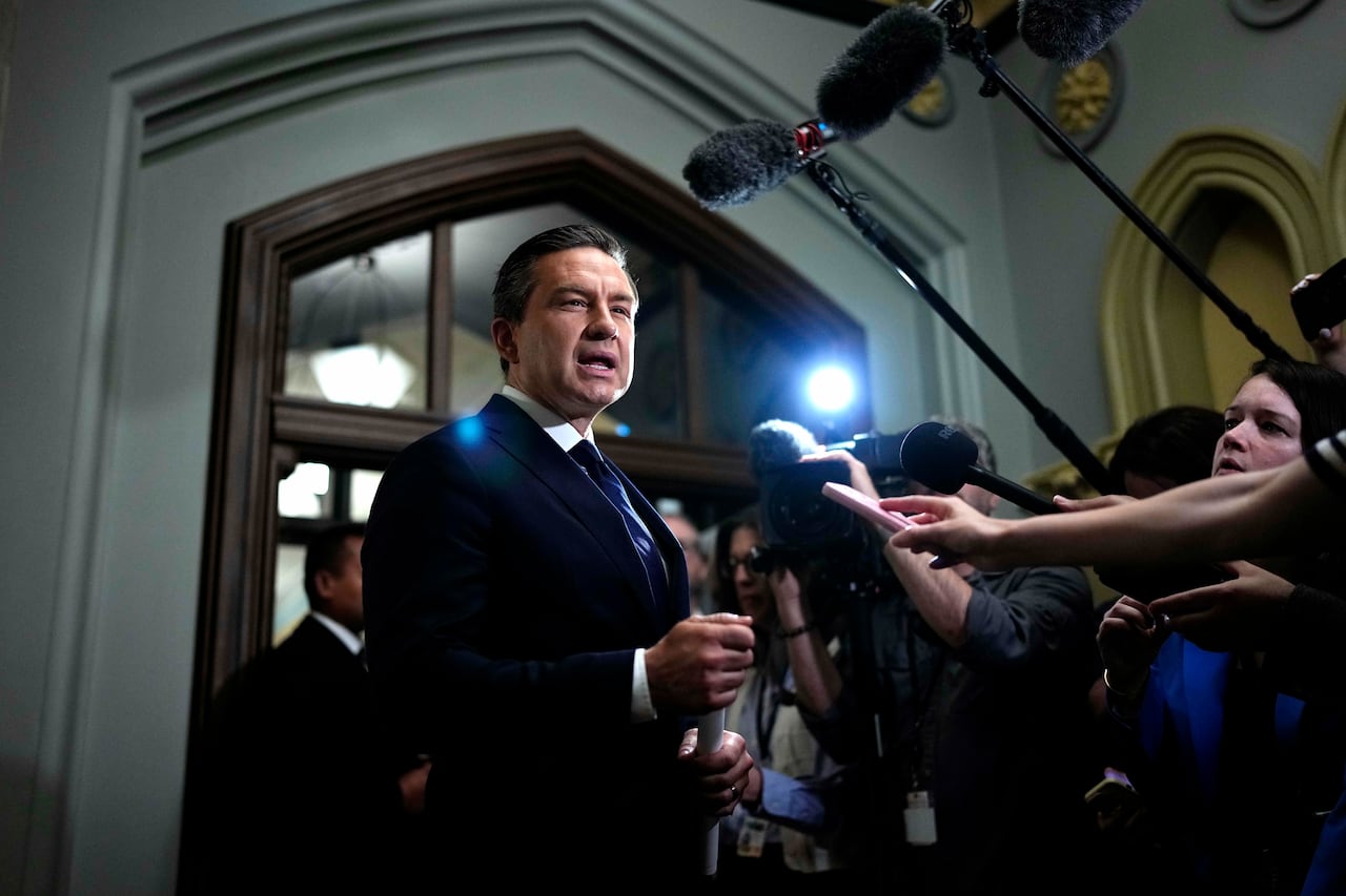 Pierre Poilievre speaks to journalists.