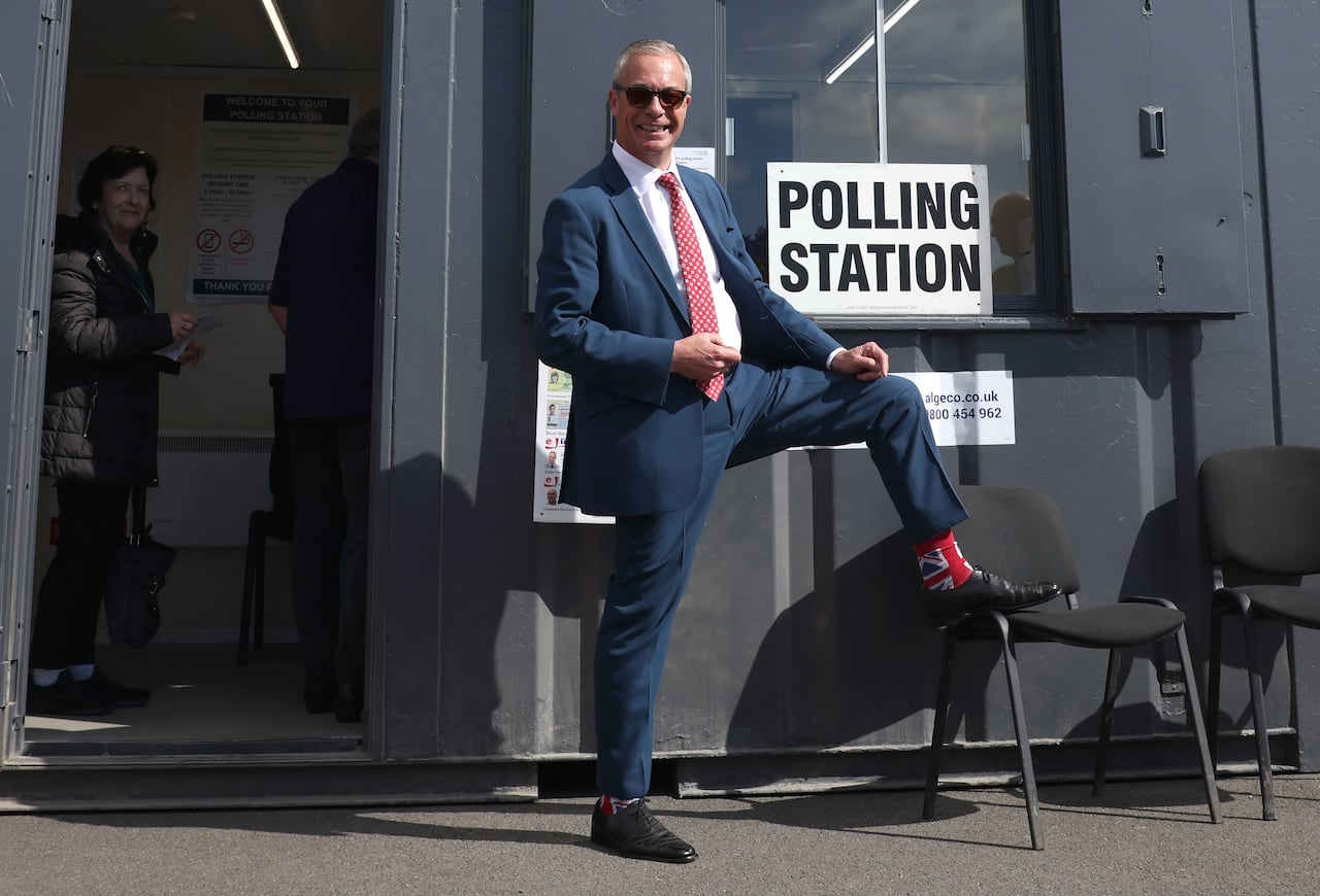 Reform UK Leader Nigel Farage arrives to cast his vote during the local council elections on May 07, 2026 in Walton-on-the-Naze, England.