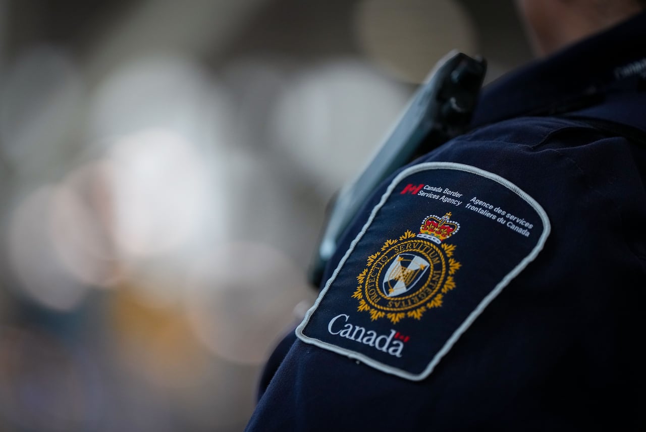 A CBSA badge.