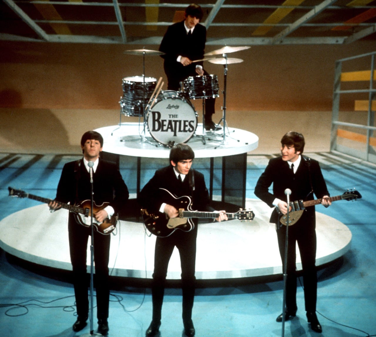 The band The Beatles performing.