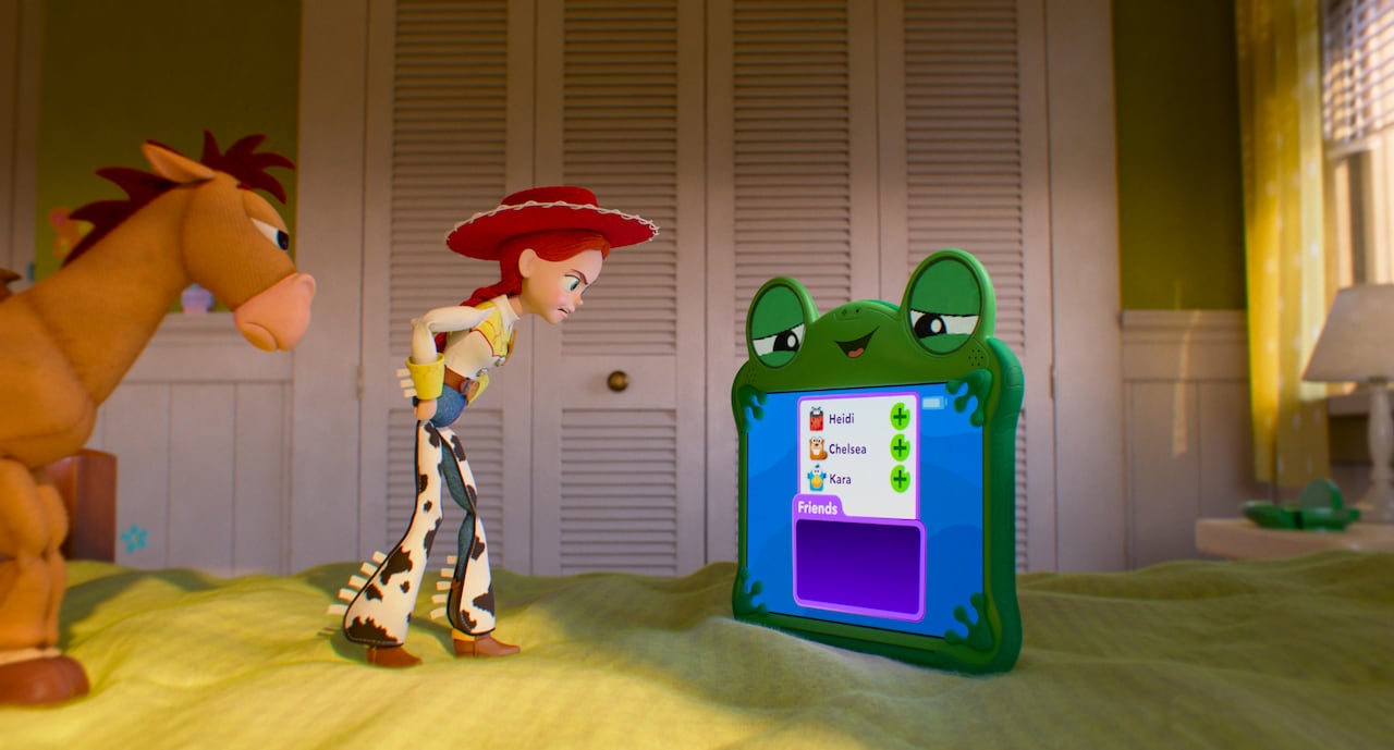 An animated image of a toy horse, cowgirl and tablet appear on a bed,