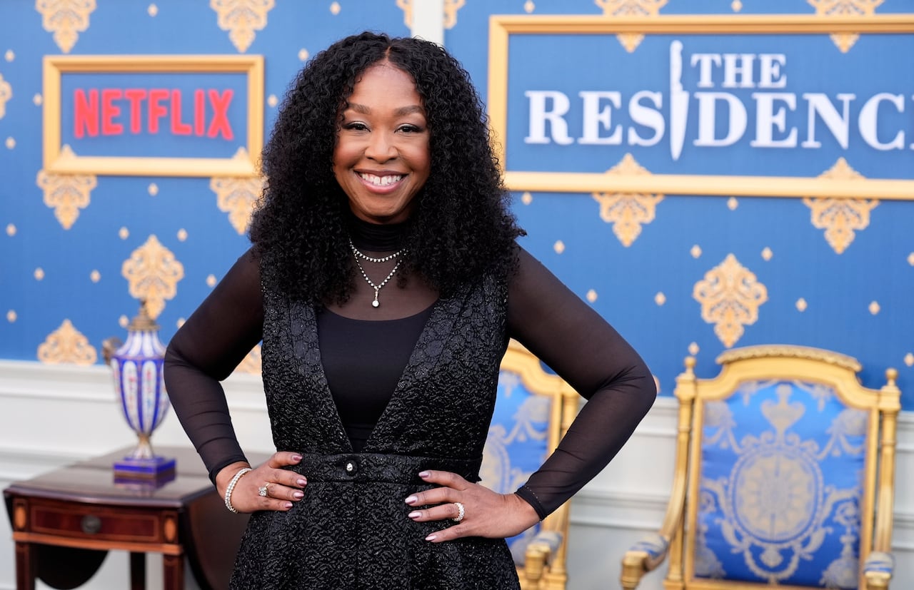 A picture of Shonda Rhimes on a red carpet event for "The Residence"