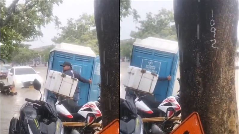 民眾幫忙把廁所移到旁邊，救裡面的人脫困。（圖／取自X）