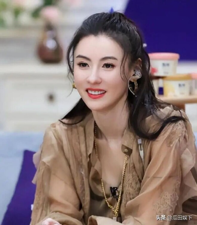 守护张柏芝27年的男人 竟是64岁单身无子女的他（配图16）