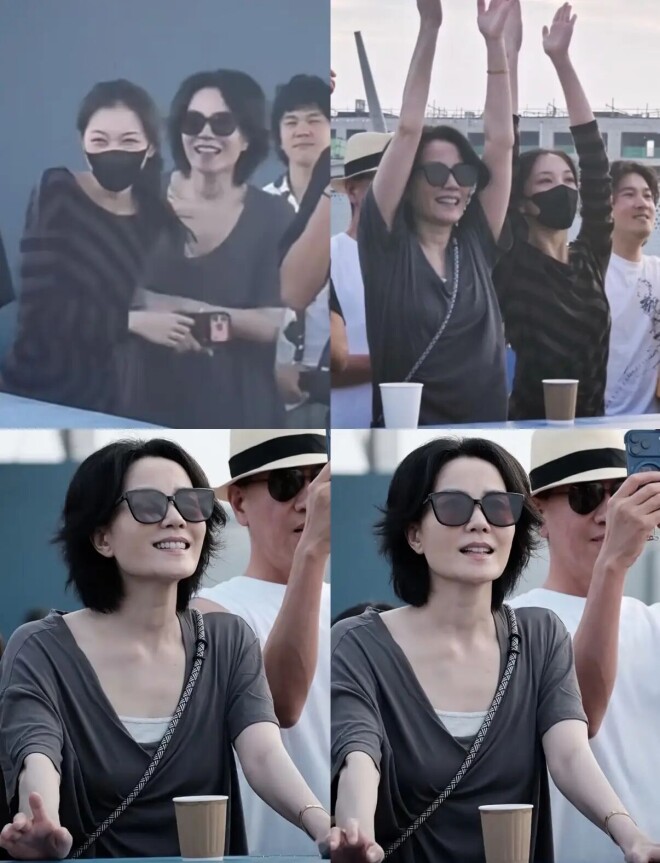 57岁王菲现身女儿演唱会 短裤雨靴秀美腿白又薄（配图18）