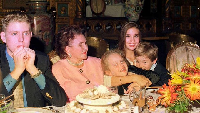 Ivanka Trump and family members seated together at a festive dinner table