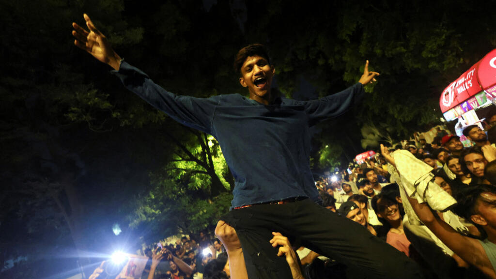 Cockroach Janta Party (CJP) supporters celebrate after the resignation of Education Minister Dharmendra Pradhan over National Eligibility cum Entrance Test (NEET) examination paper leaks, at Jantar Mantar in New Delhi, July 25. 2026.