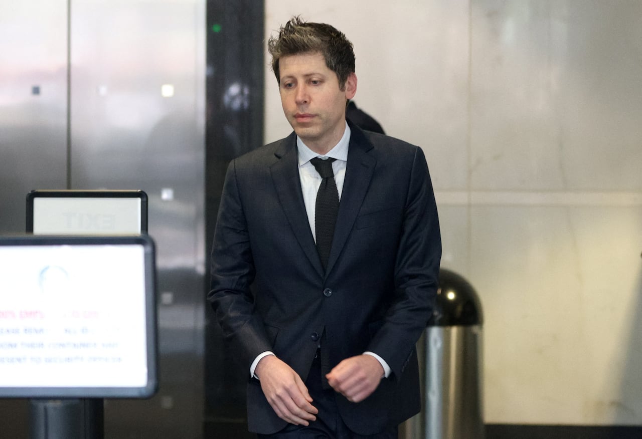 A person walks inside a courthouse.