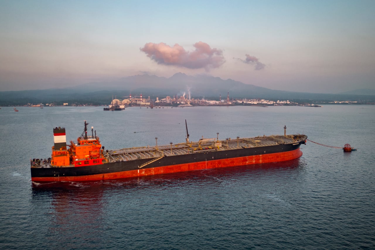 LIMAY, PHILIPPINES - APRIL 01: In an aerial view, the Panamanian-flagged Tiger Wings, carrying crude oil from Russia, is moored off the Petron oil refinery on April 1, 2026 in Limay, Bataan province, Philippines. The Philippines confirmed its first R