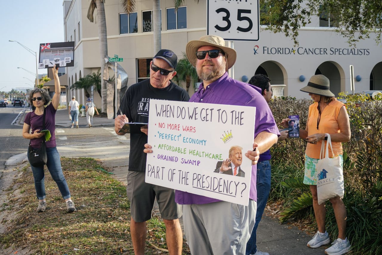 Florida Democratic congressional candidate, Allen Spence, right, says redistricting has been a challenge for his campaign to navigate. The changes dispersed Democratic, mostly minority, voters into areas where Republicans are dominant.