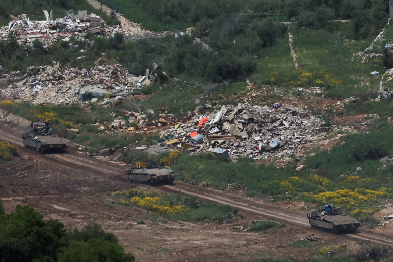 Israeli military vehicles leave Lebanon, as seen from the Israeli side of the Israel-Lebanon border, in northern Israel, May 6, 2026.