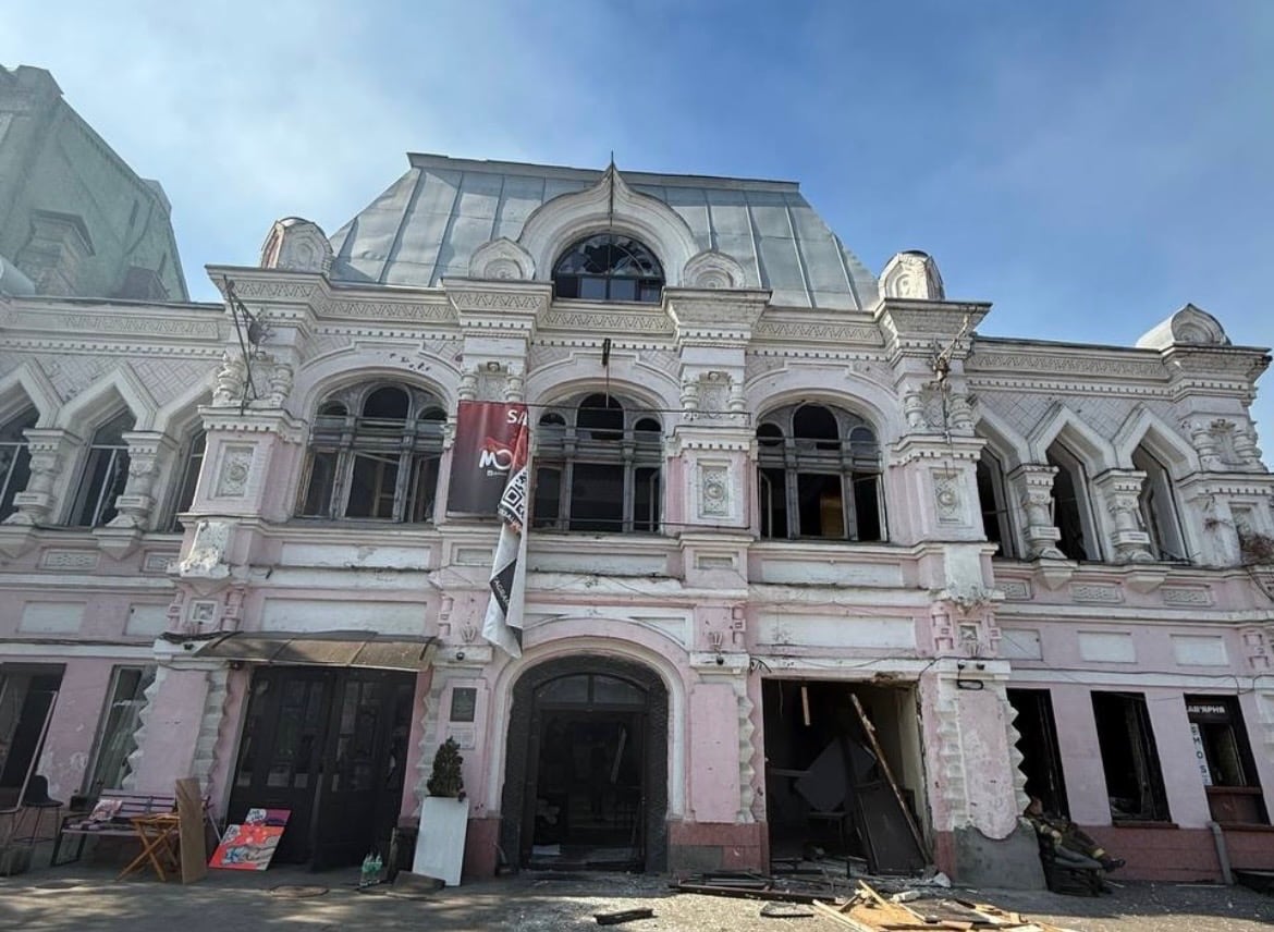 An exterior of a damaged Opera building.