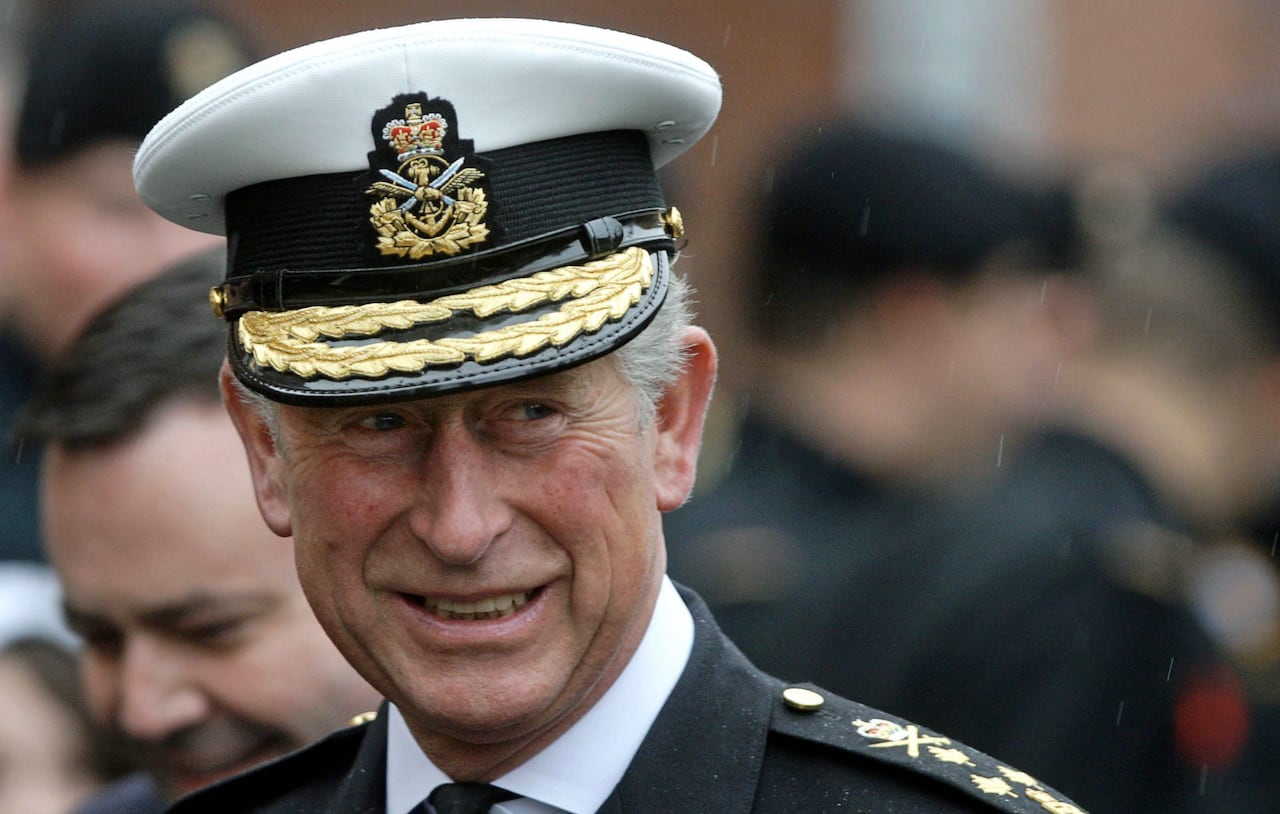 Charles smiles while wearing the Canadian Navy uniform during a visit to Canadian Forces Base Esquimalt near Victoria, B.C., in 2009.