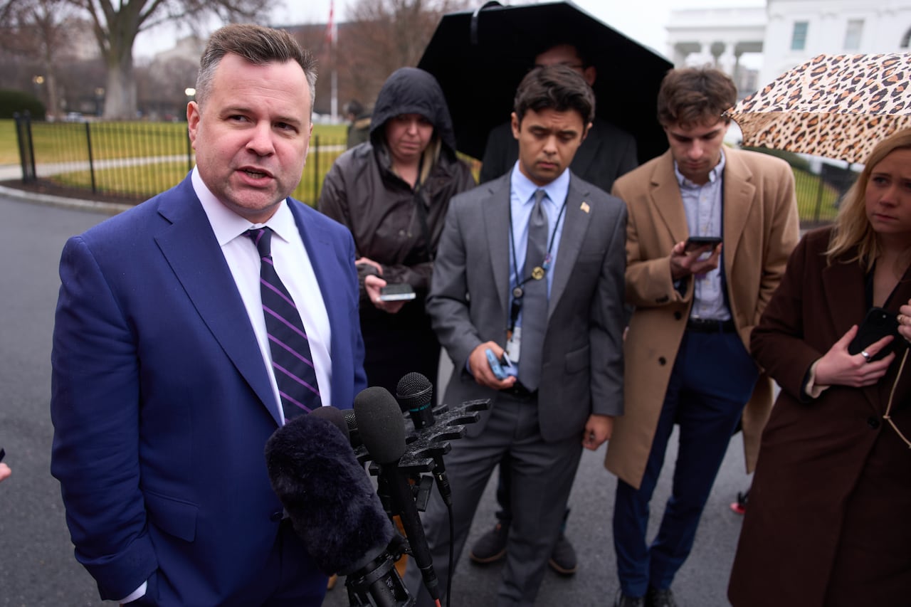 Bill Pulte, at left, speaking to a group of reporters at the White House, in January 2026.