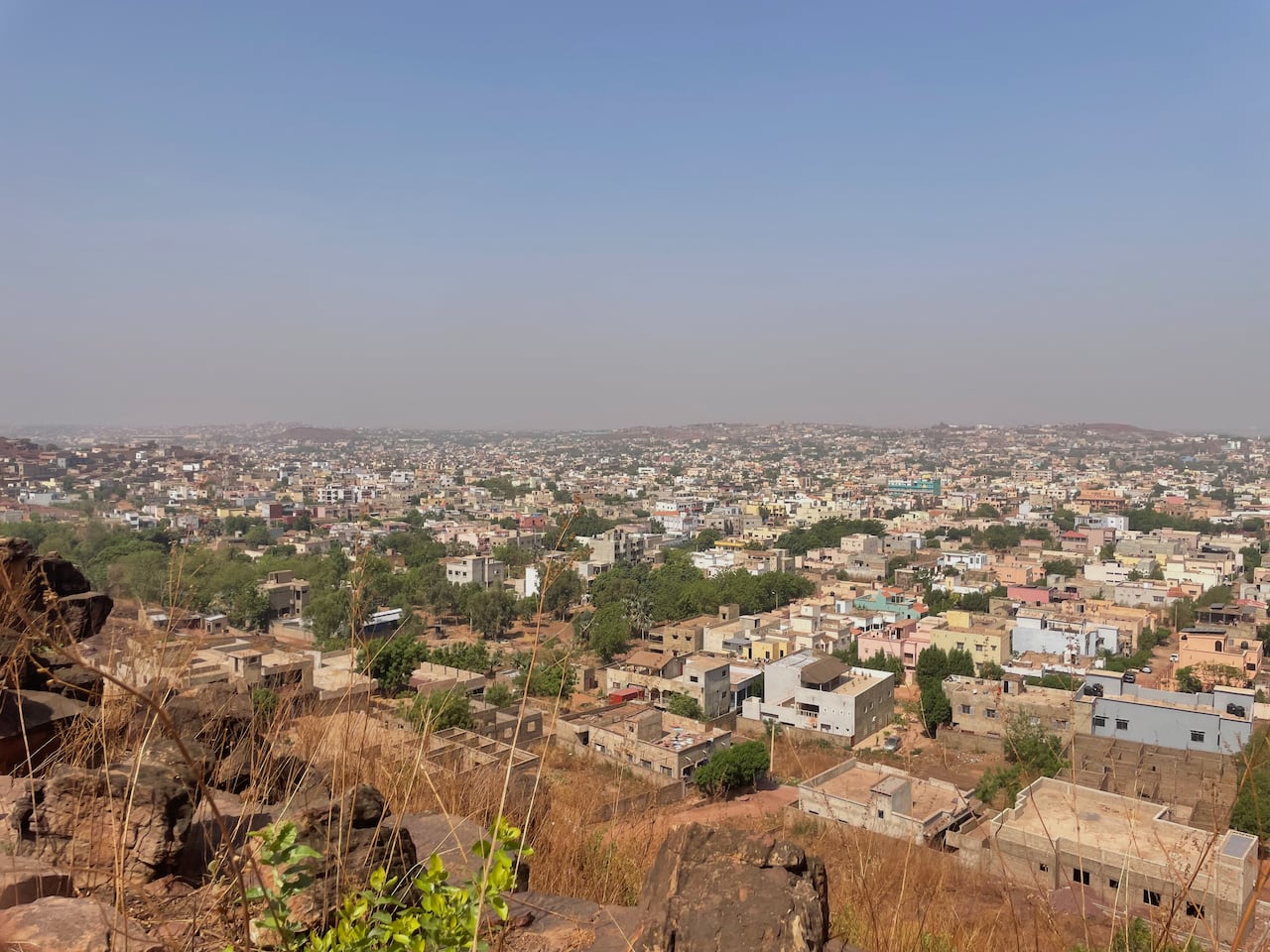 An aerial view shows a city.