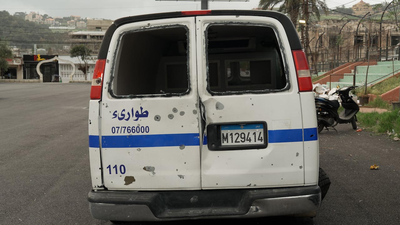 The back of the paramedic's ambulance punctured by shrapnel from the Israeli strike.