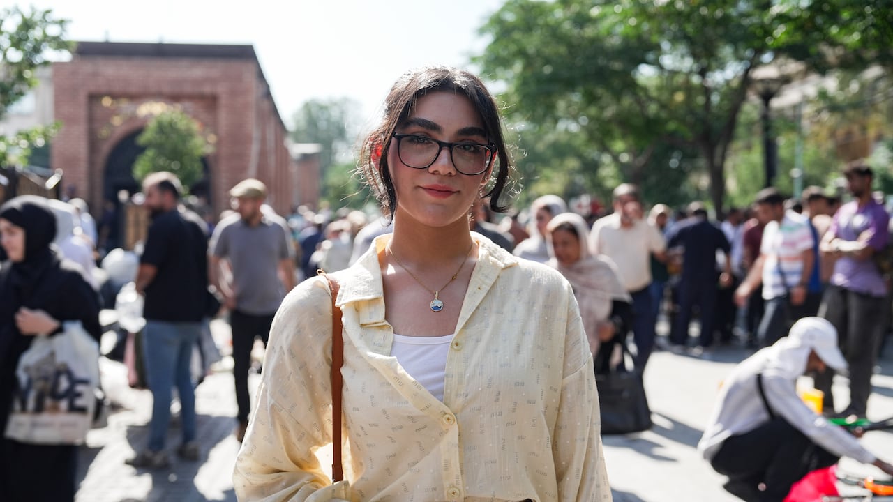 A person looks toward the camera.