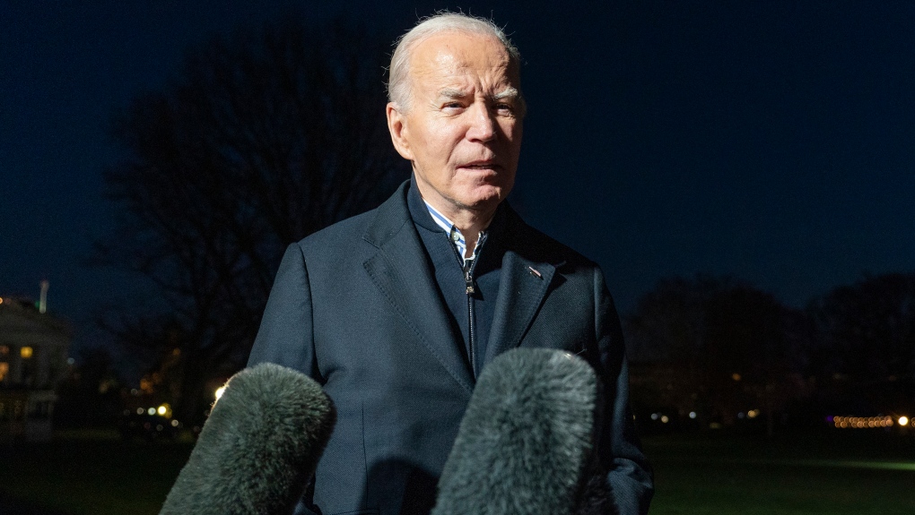 President Joe Biden answers a reporter's question as he walks from Marine One upon arrival on the South Lawn of the White House, Dec. 20, 2023, in Washington. Biden ordered retaliatory strikes Monday, Dec. 25, against Iranian-backed militia groups after three U.S. servicemembers were injured in a drone attack in Northern Iraq. (AP Photo/Alex Brandon, File)