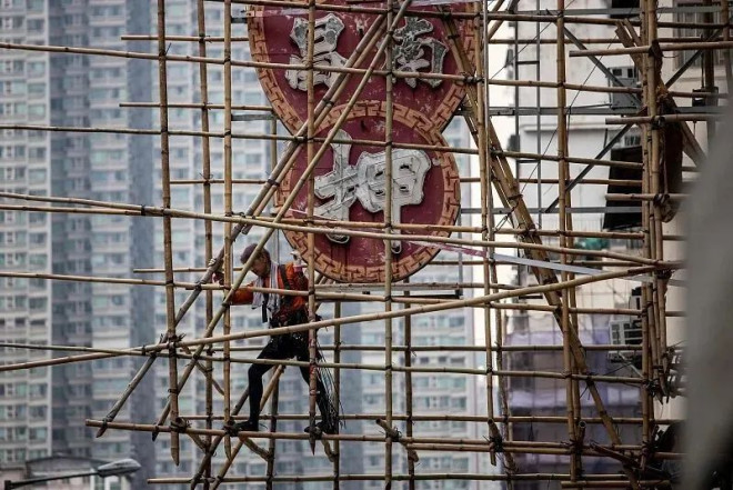 香港建筑工人一个月能赚10万?招工中介揭秘内情(图)