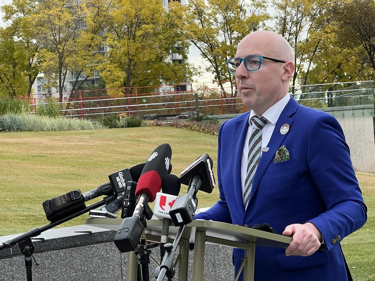 A man stands at a podium.