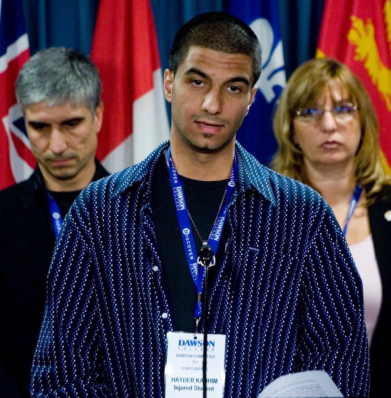 Dawson College shooting victim Hayder Kadhim and the parents of slain student Anastasia De Sousa, Louise and Nelson De Sousa, address reporters at a news conference  in Ottawa Tuesday Nov 28, 2006, calling for the government to keep the gun registry.