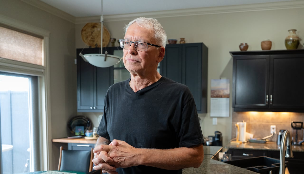 Karl standing in his kitchen