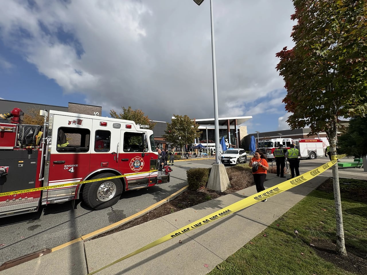 A fire truck outside a shopping mall.