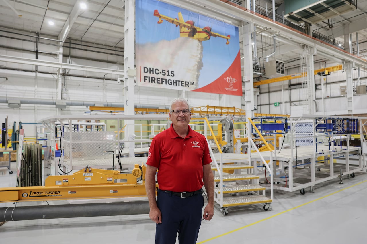 Neil Sweeney, vice-president of corporate affairs for Westerkirk Capital, the company which holds De Havilland Canada, poses for a picture as De Havilland produces the Canadair 515 water bomber to combat wildfires, in Calgary, Alta., in August 2025.
