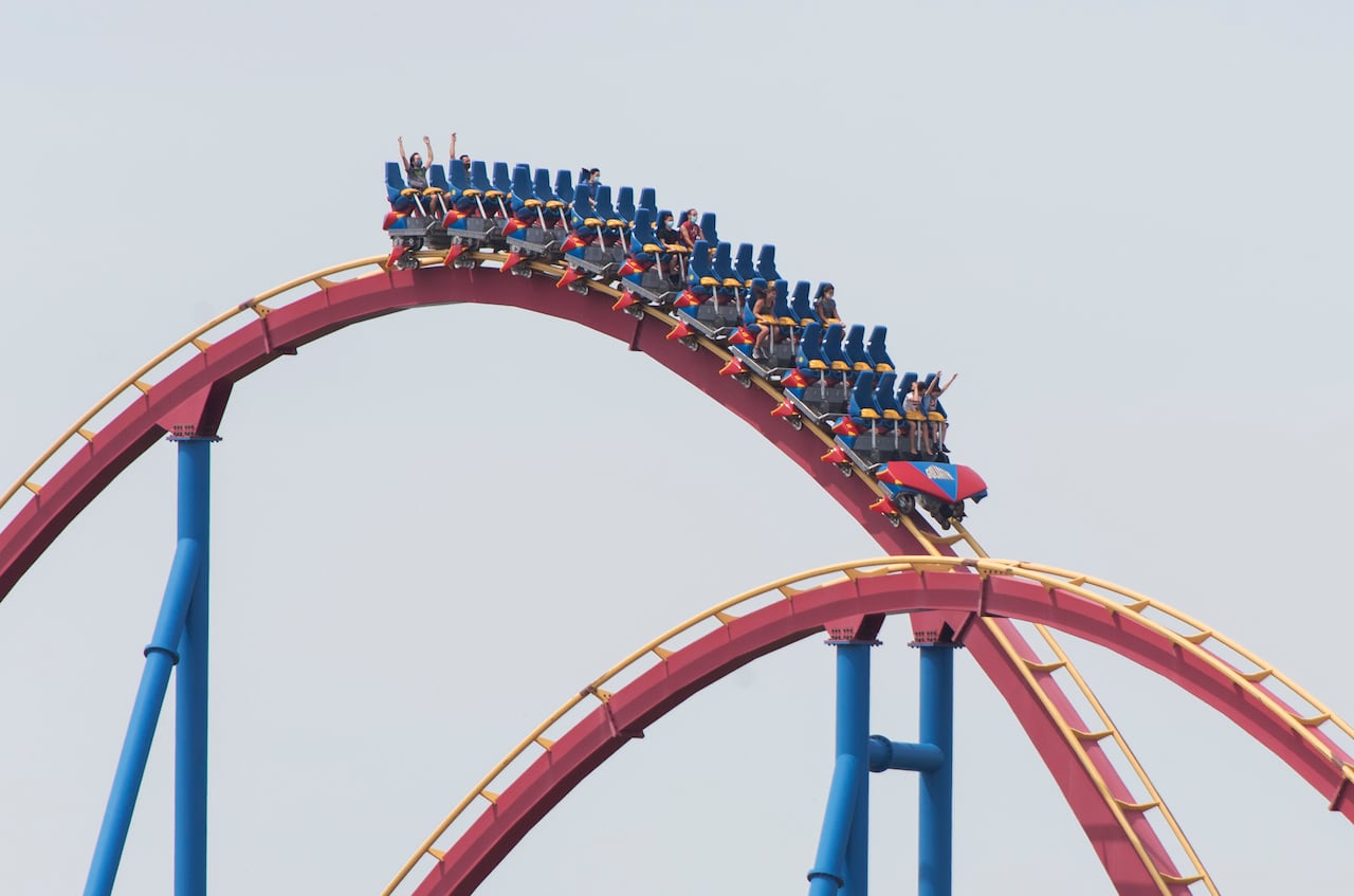 People on rollercoaster about to go down the drop