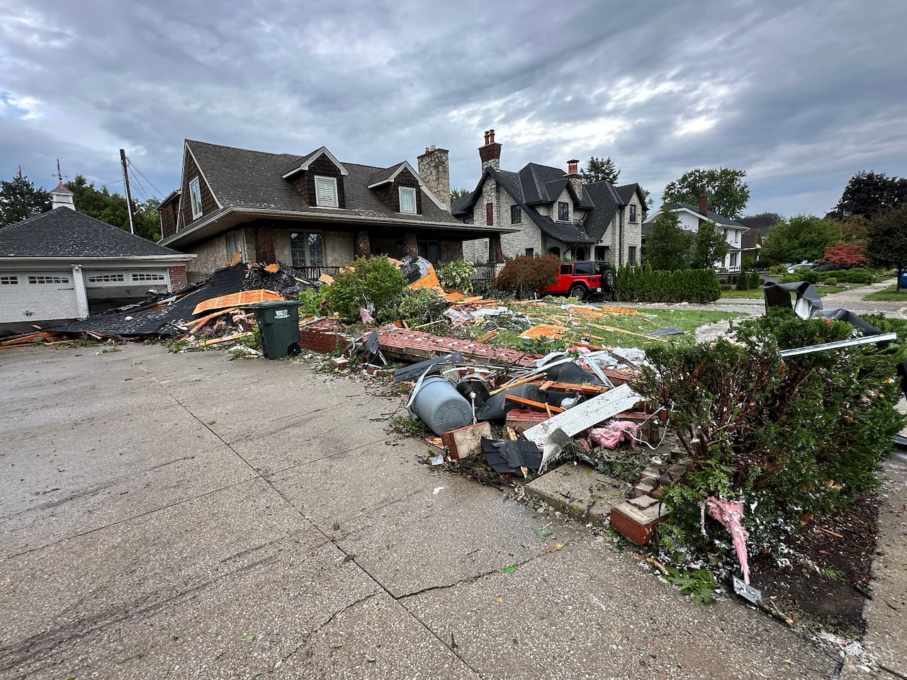 a picture of a house covered in debris
