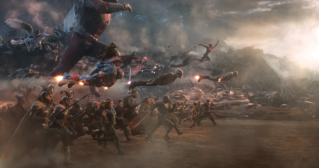 A CGI image shows a group of people running and flying through the air.