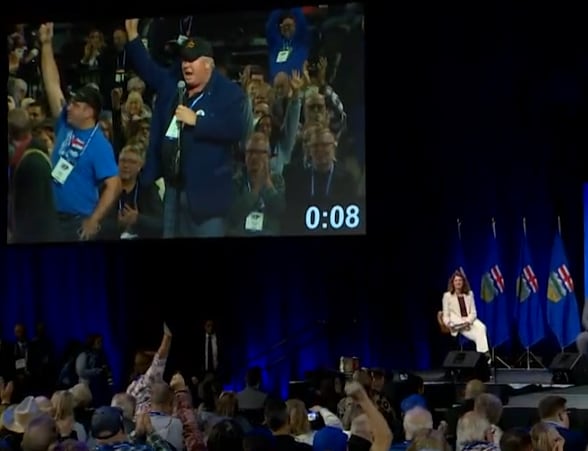 Jeff Rath is cheered at the 2025 UCP AGM.