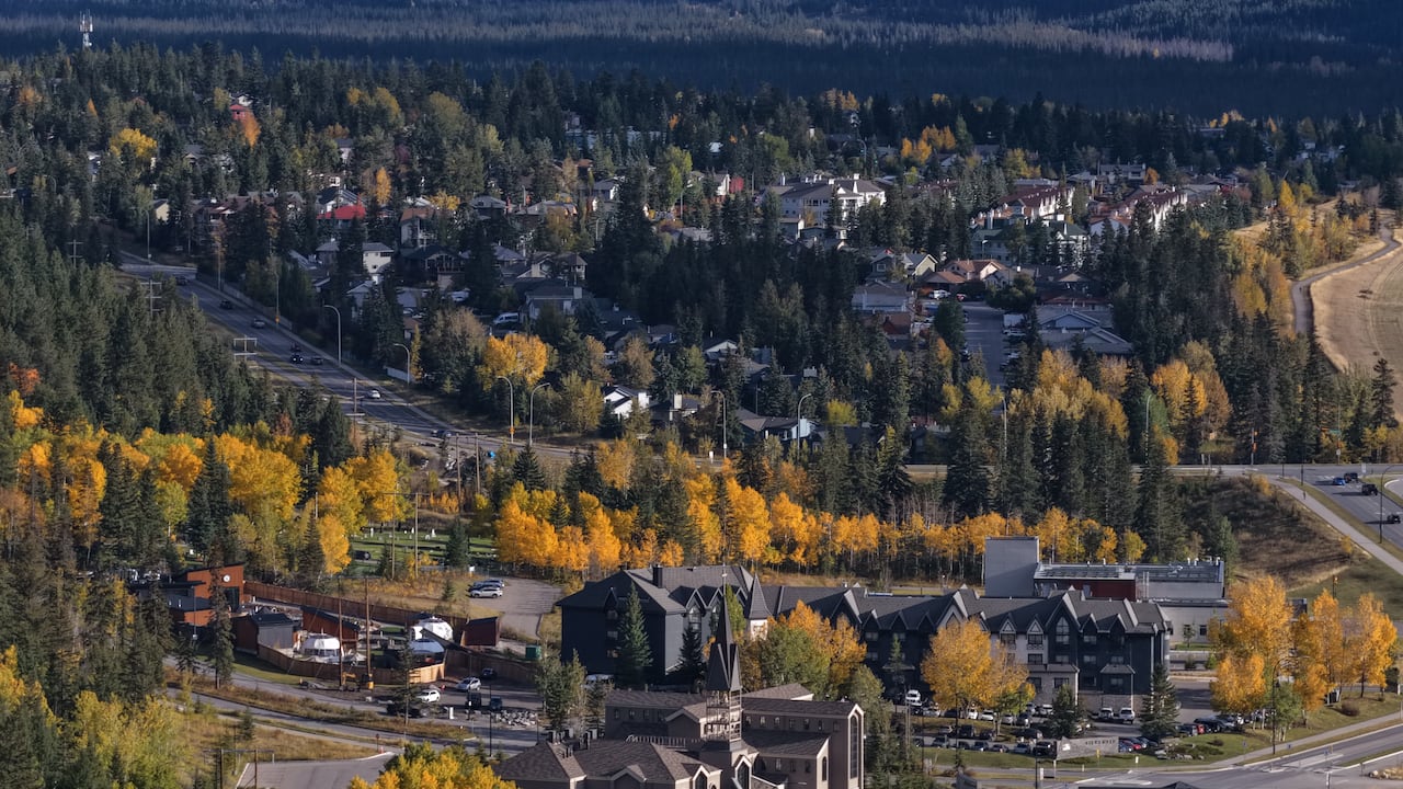 A bird's-eye view of a mountain base town.