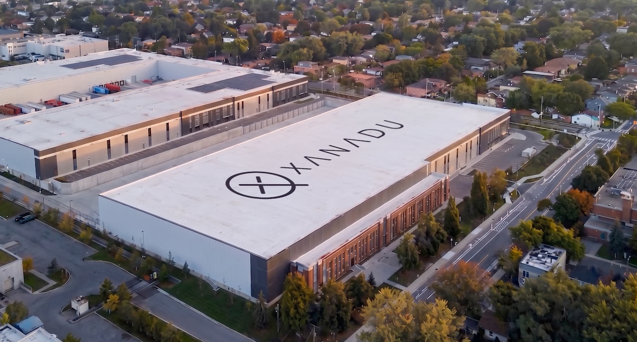 An inception of a large building with the Xanadu on the flat roof.