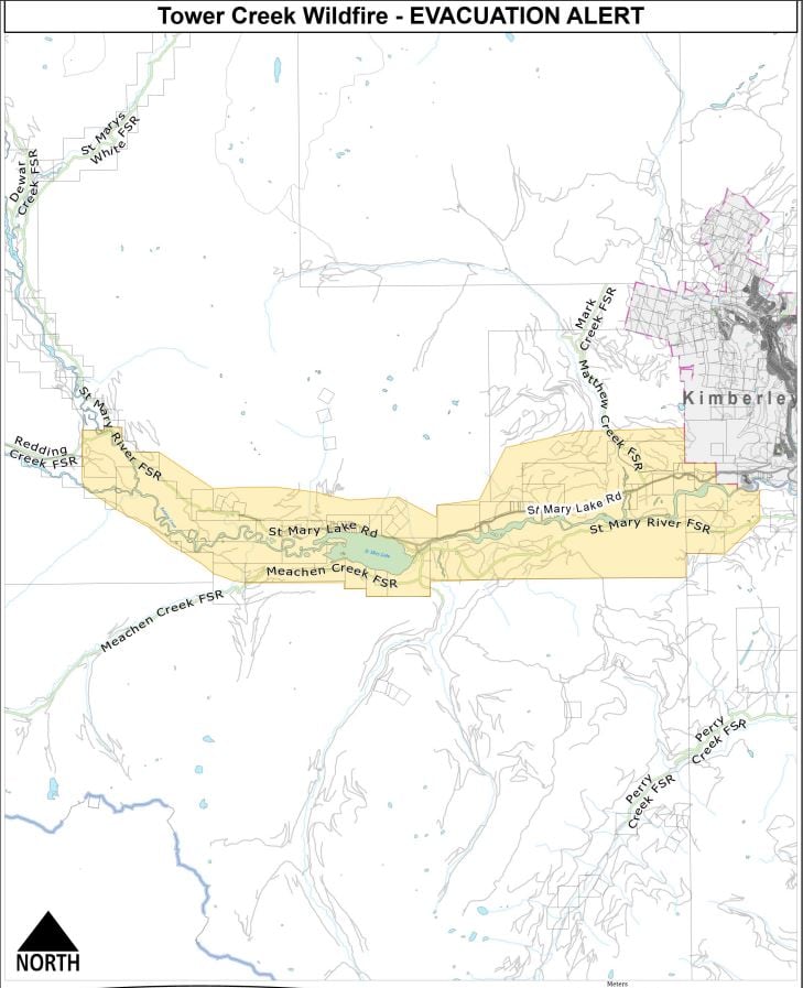 A map highlights an evacuation alert area stretching west from Kimberley along St. Mary Lake Road and the St. Mary River.