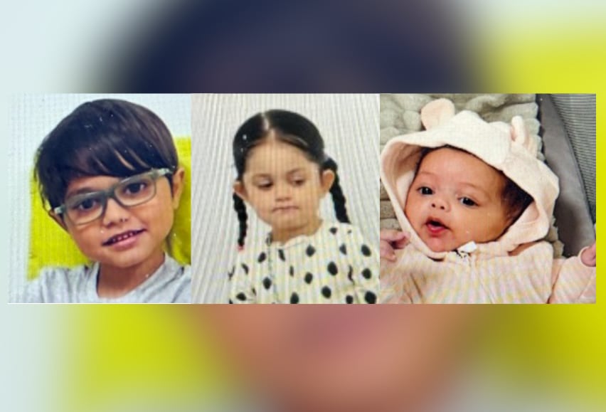 Three children, respectively with green glasses and a grey shirt, white shirt with black polka dots, and pink jumpsuit.