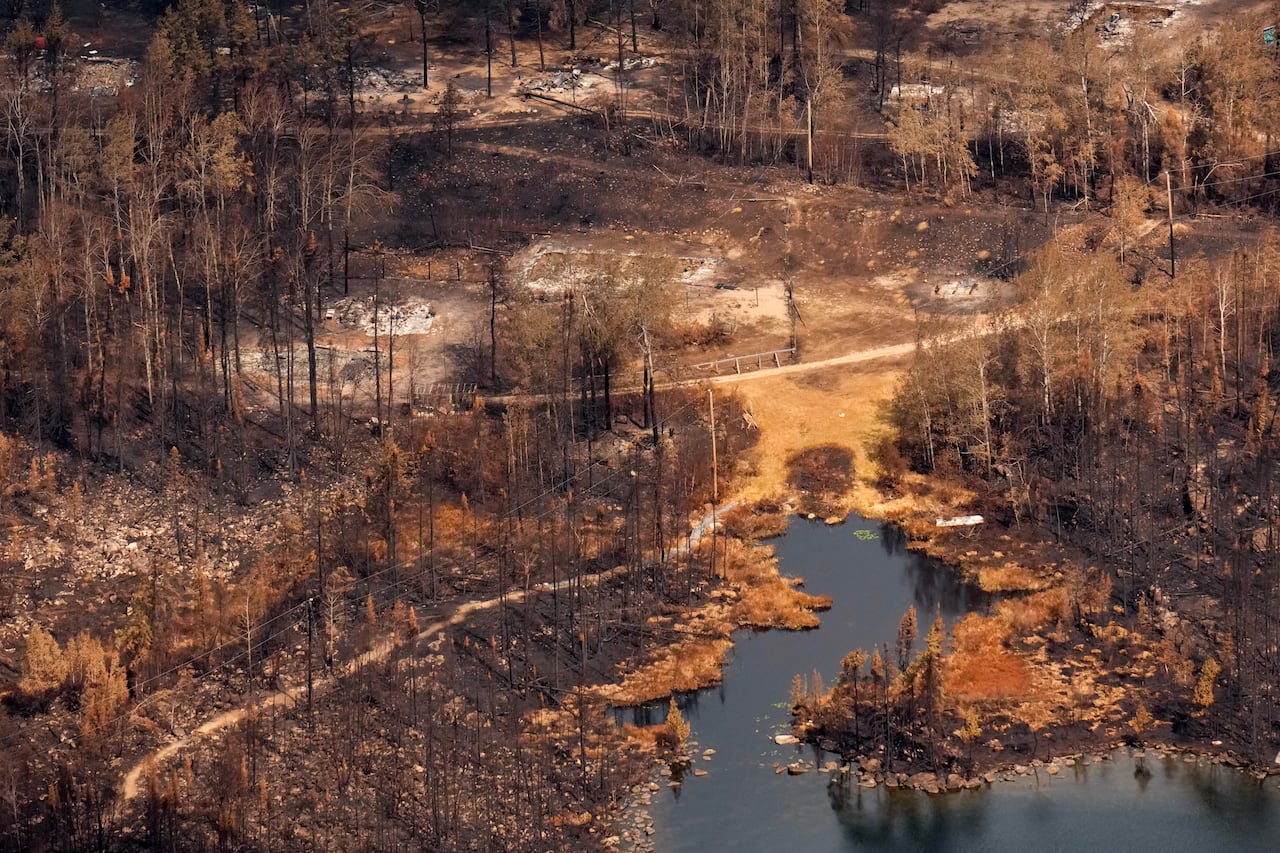 Wildfire damage is pictured from the air in Collins First Nation, a small, remote Ojibwa community located in northwestern Ontario, about 250 km north of Thunder Bay, Ont., on Wednesday, July 22, 2026. THE CANADIAN PRESS/Chris Young