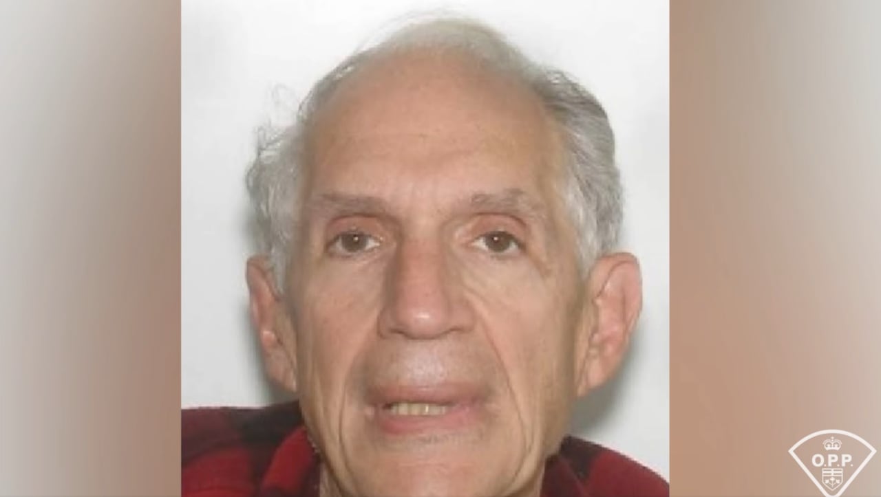 An older man's photo in front of a white background.