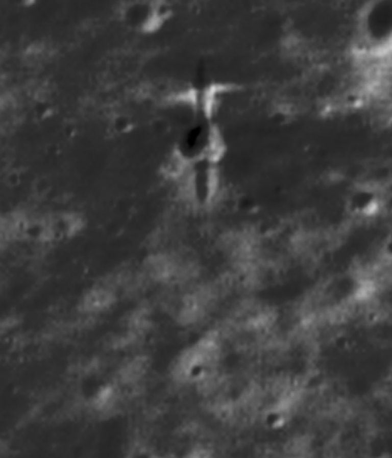 A grey image with a thick, dark area near its centre.