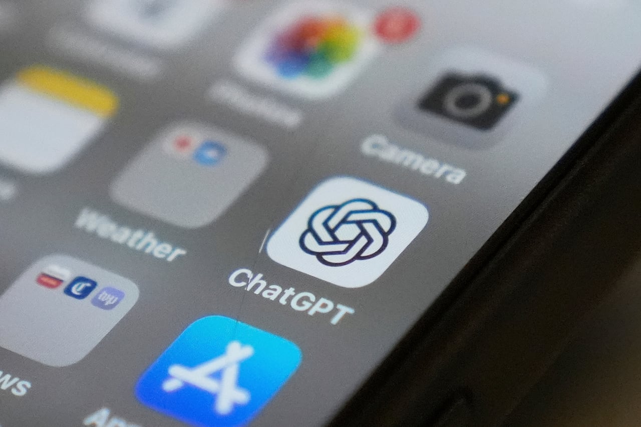 A close up of a phone screen with ChatGPT app button in focus