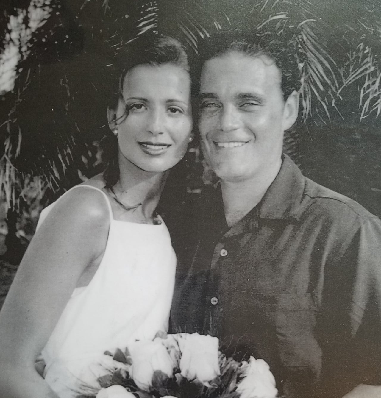 Monica Iken-Murphy poses for a wedding photo with her husband Michael Iken.