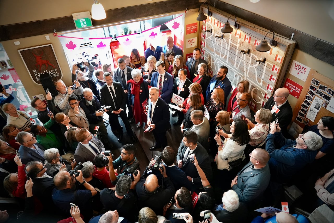 Prime Minister Mark Carney is seen at a national unity rally at a brewery in Red Deer, Alta., on Oct. 16, 2026.