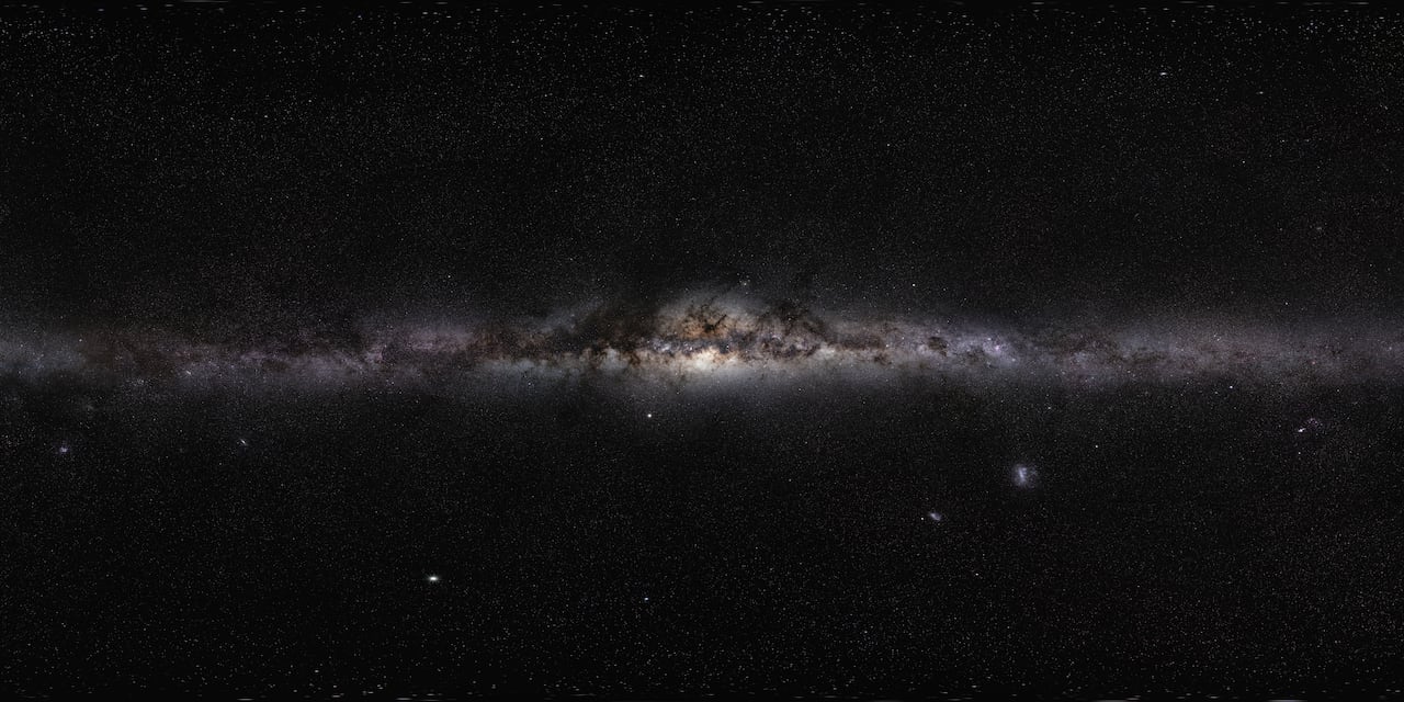 A panoramic of the Milky Way shows a large collection of stars.