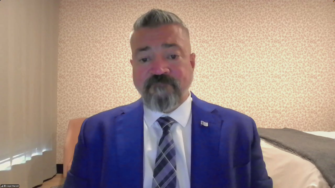 Man in blue suit.